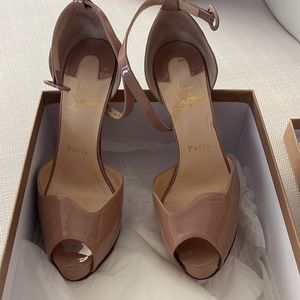 Christian Louboutins patent nude platform heels